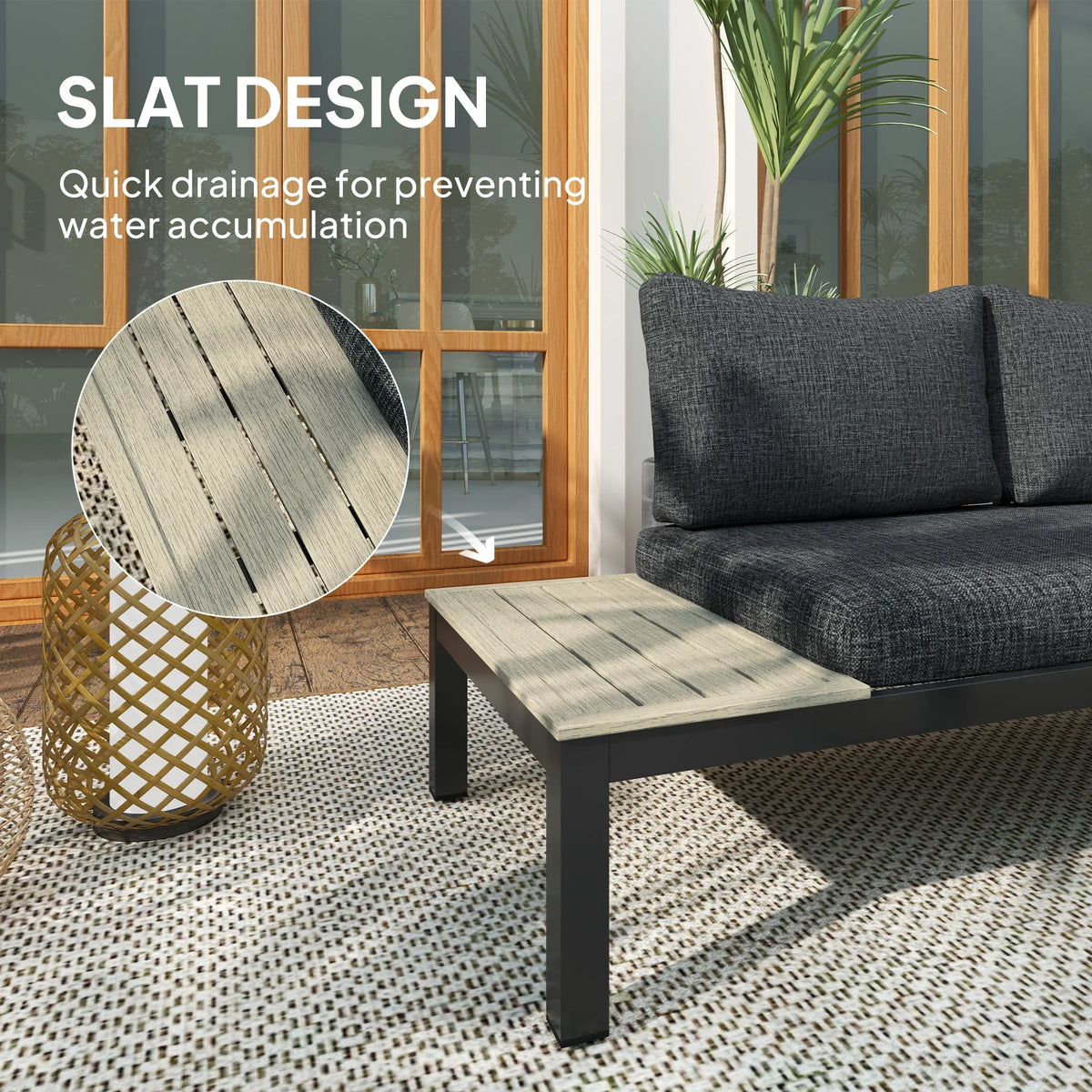 Dark gray outdoor sofa with slatted light tabletop side surfaces and matching black coffee table