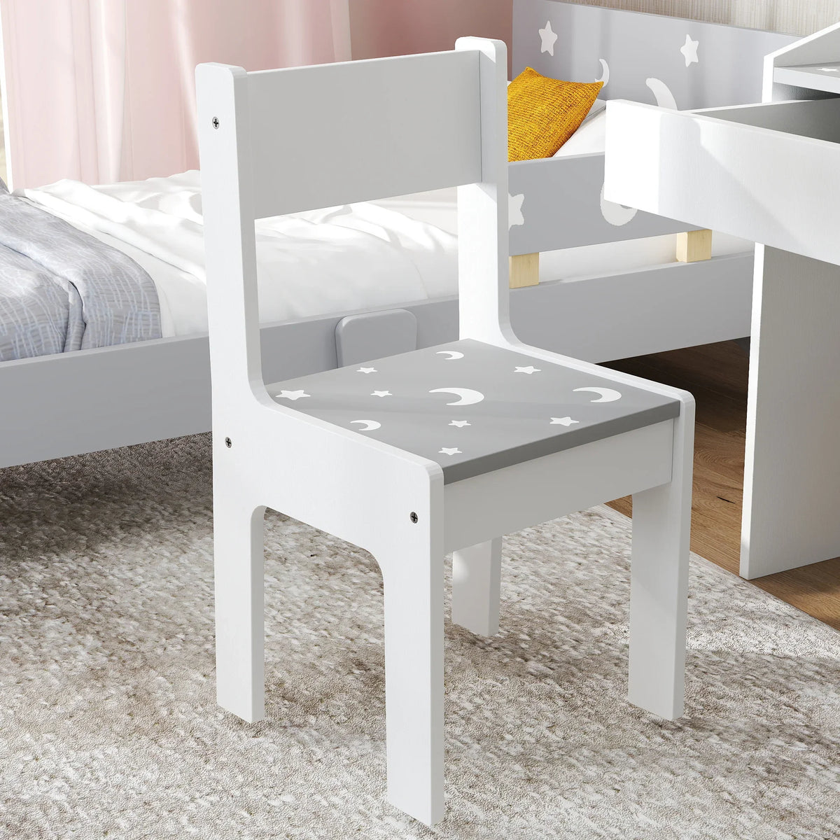 Grey kids chair with star-and-moon patterned seat, matching study table set