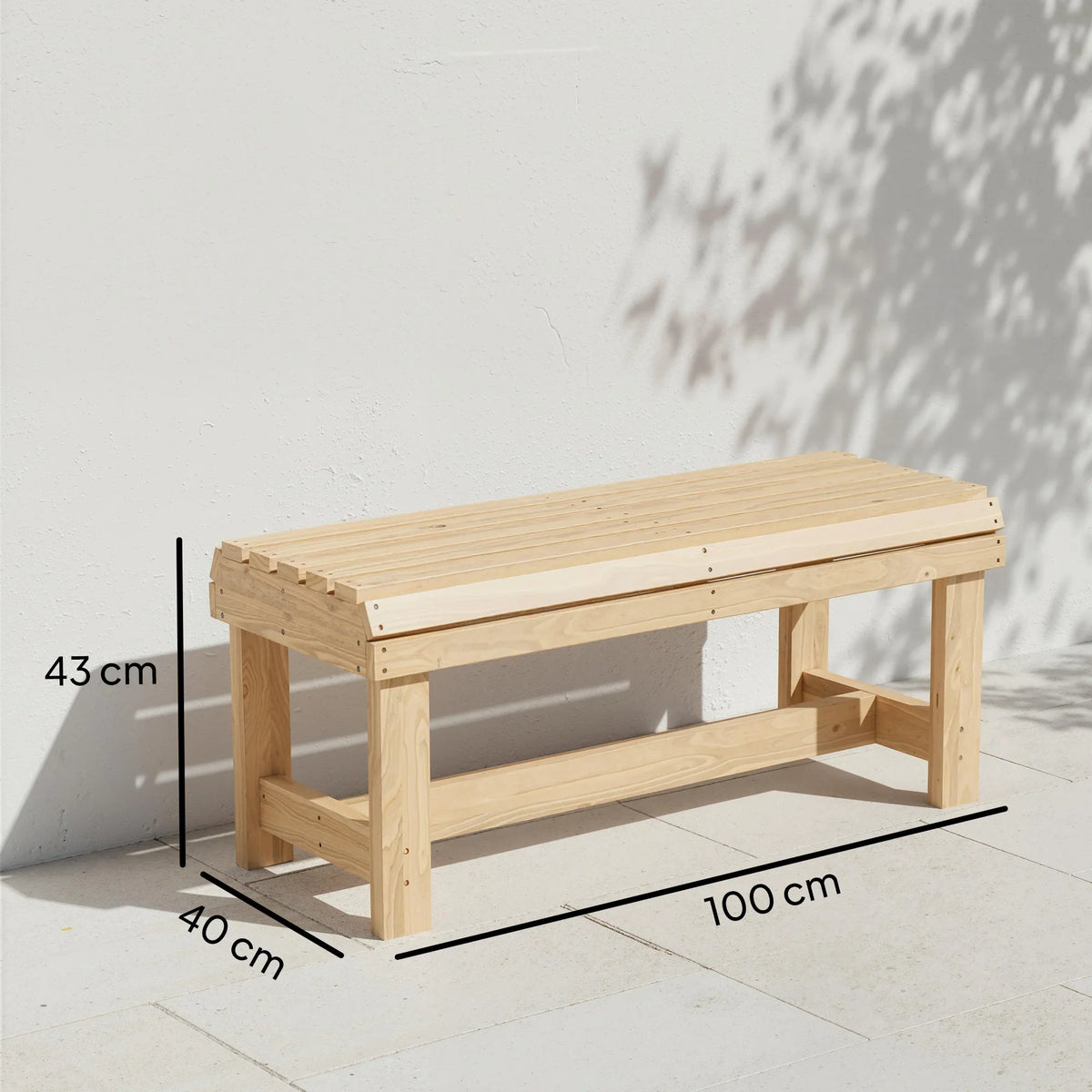 Natural wood backless bench with slatted seat and curved edge profile