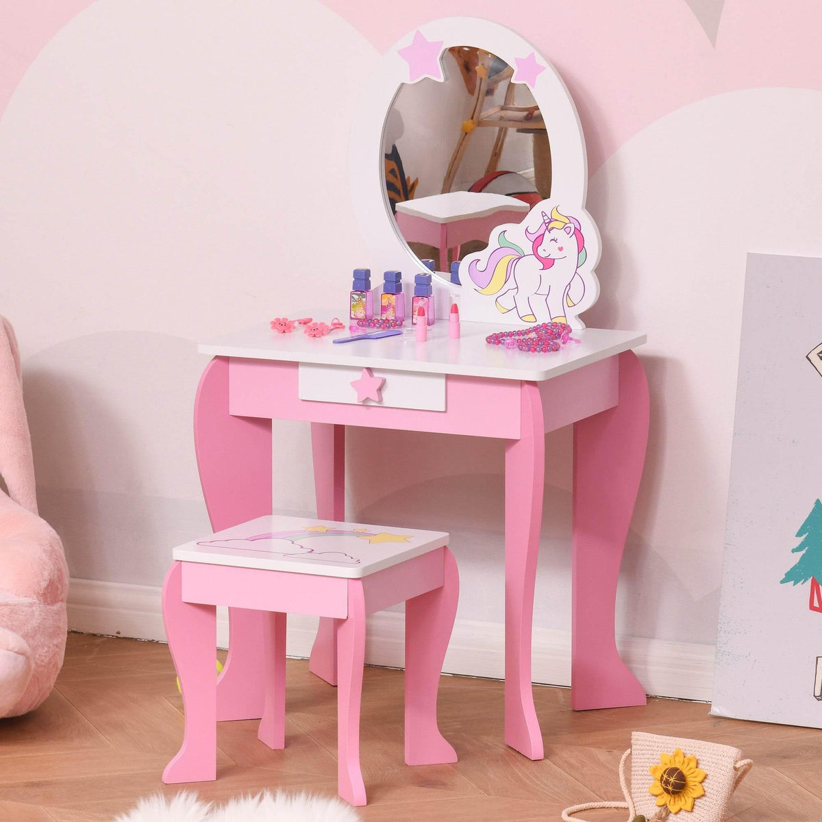 Kids unicorn vanity set with oval acrylic mirror, pink-and-white table, and stool