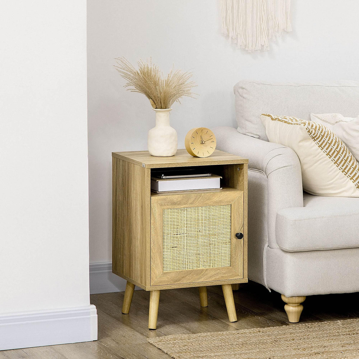 Rattan-inspired bedside table with open shelf and woven cupboard door, light wood