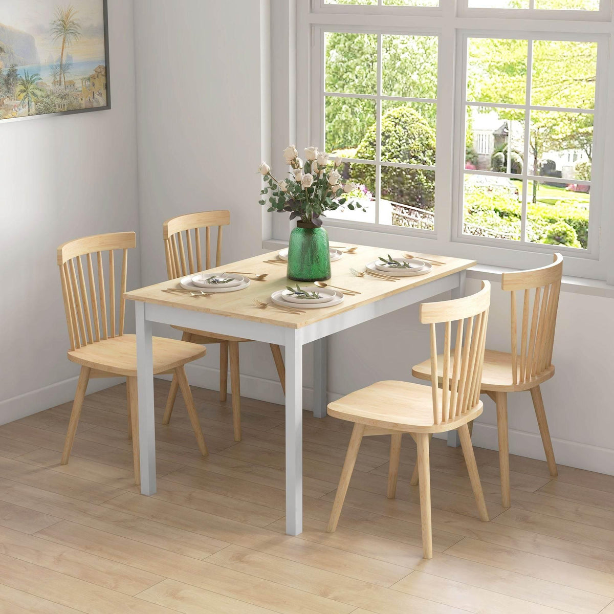 Four-seat dining table with light pine top and white base, paired with wooden chairs