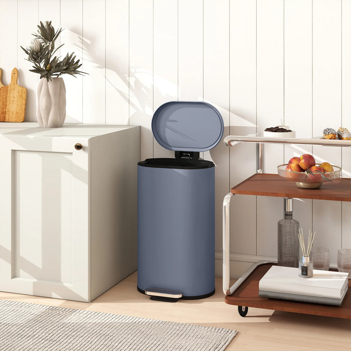 Kitchen pedal trash can with curved soft-close lid, slim round design
