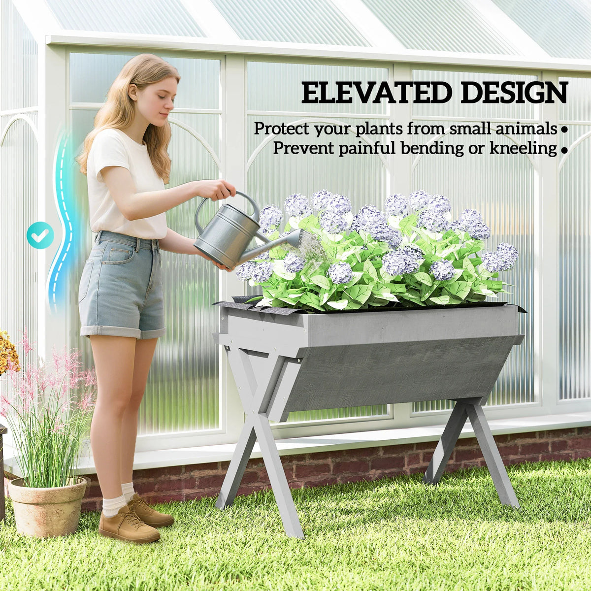 Light grey raised garden bed with dark planter box and four angled legs