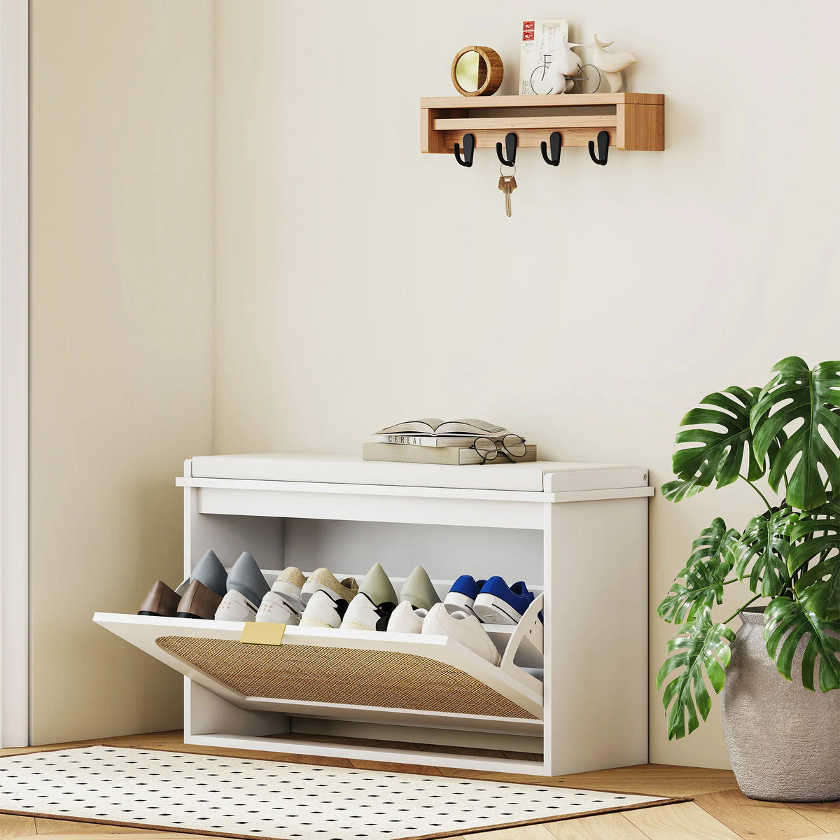 White shoe bench with padded seat, open storage shelves, and tan rattan flip drawer