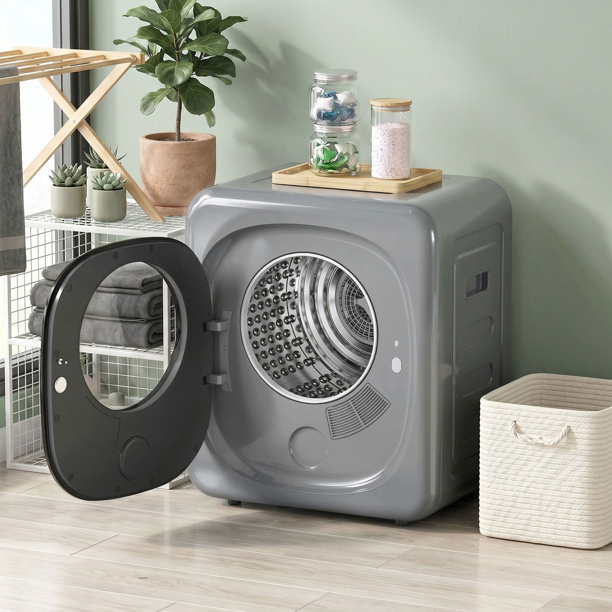 Compact vented front tumble dryer in silver with open door and visible drum