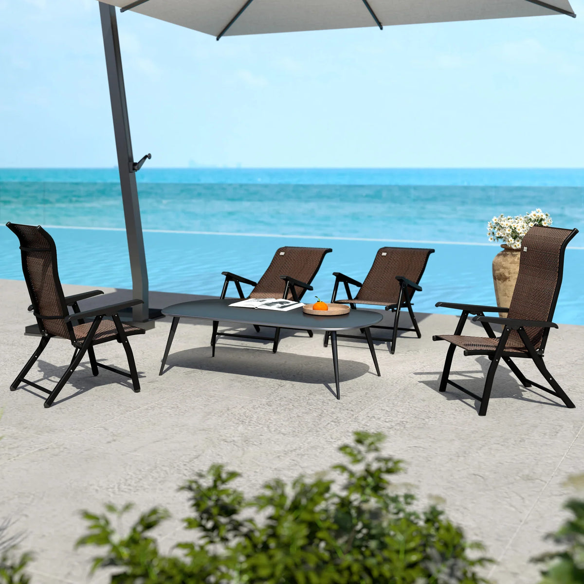 Dark brown folding garden chairs with adjustable backs and woven seats, patio set