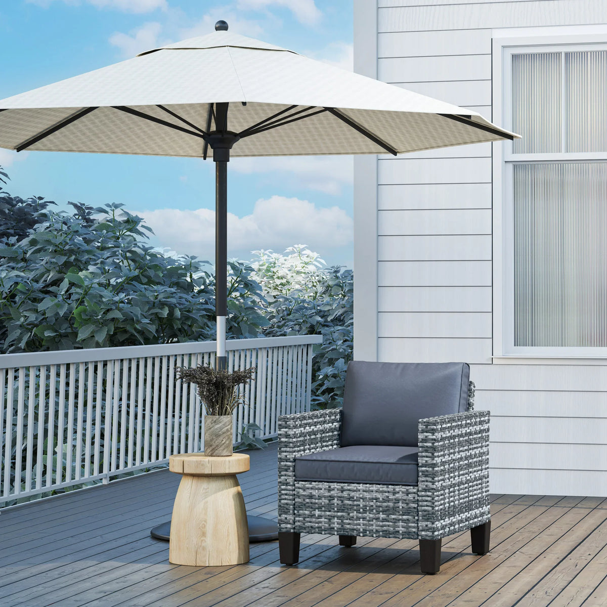 Light grey wicker single armchair with blue cushion and armrests on dark feet