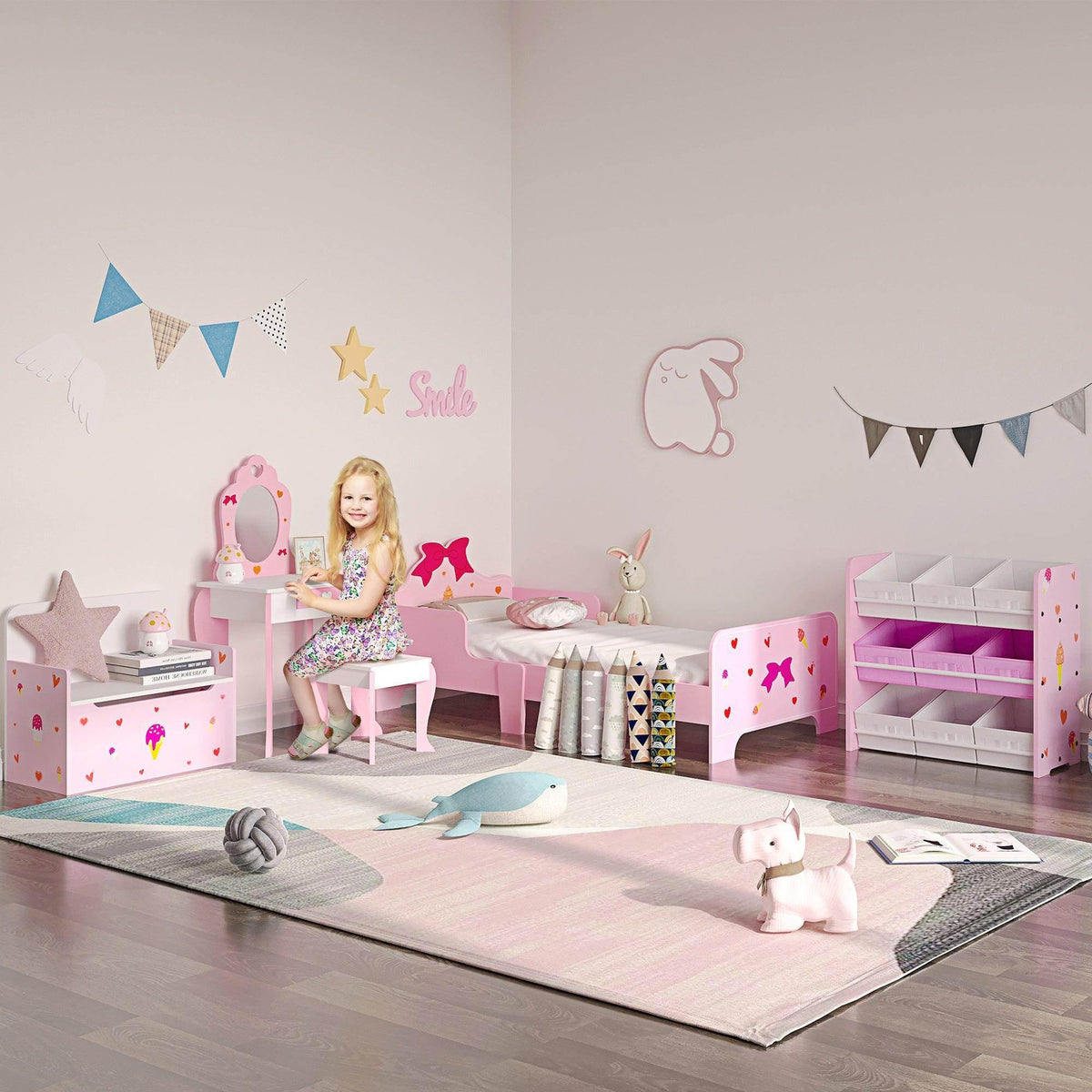 Pink kids toddler bed with cute heart and bow pattern, low guard rails