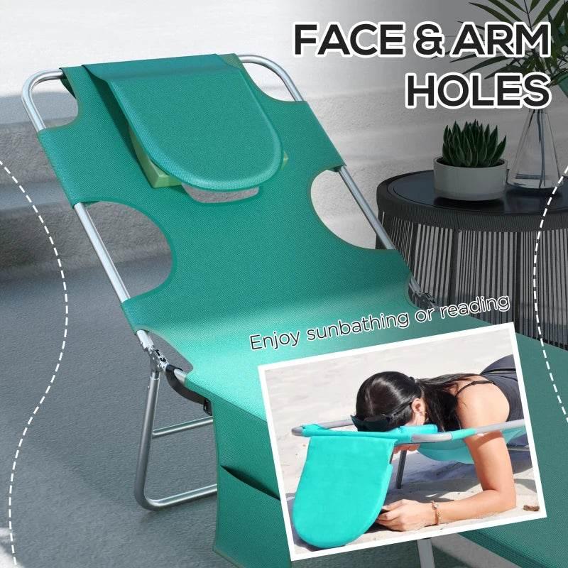 Green sun lounger with face-and-arm openings, padded headrest, and side pocket
