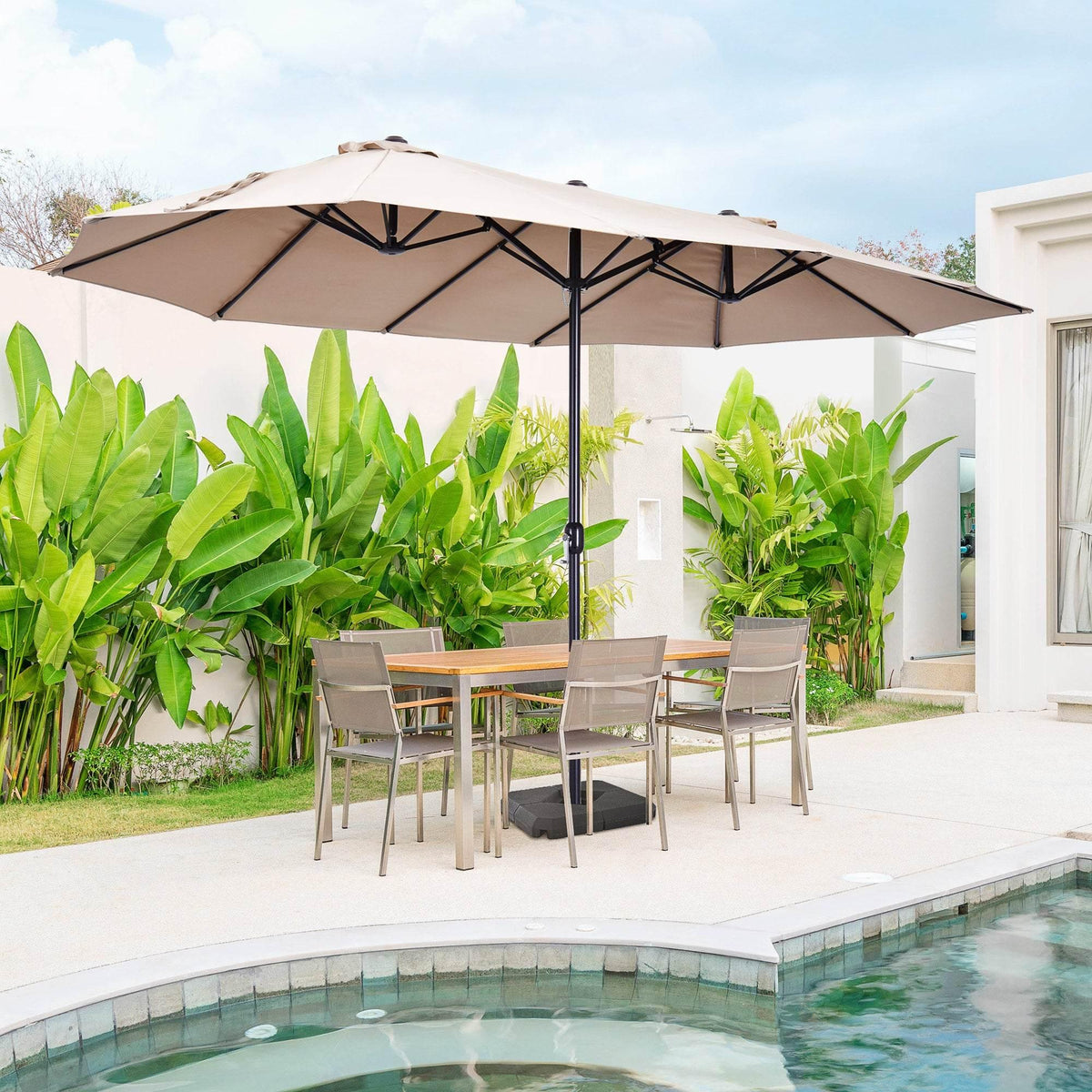 Tan double-canopy garden umbrella with crank lift and steel base