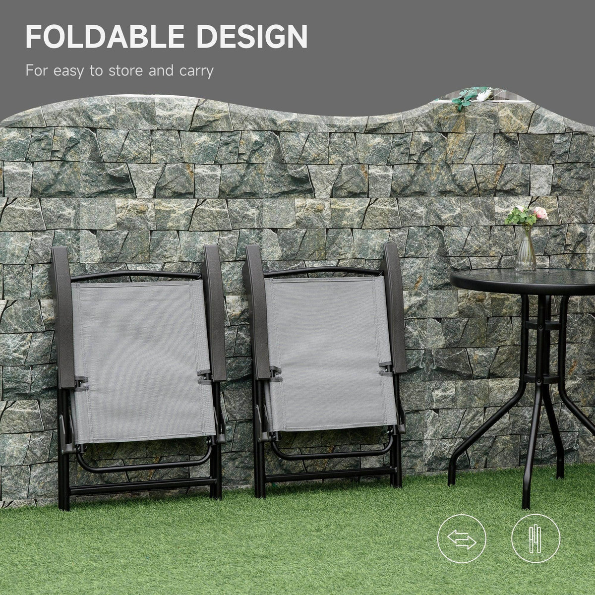 Foldable grey mesh bistro chairs and round glass-top table in patio setting