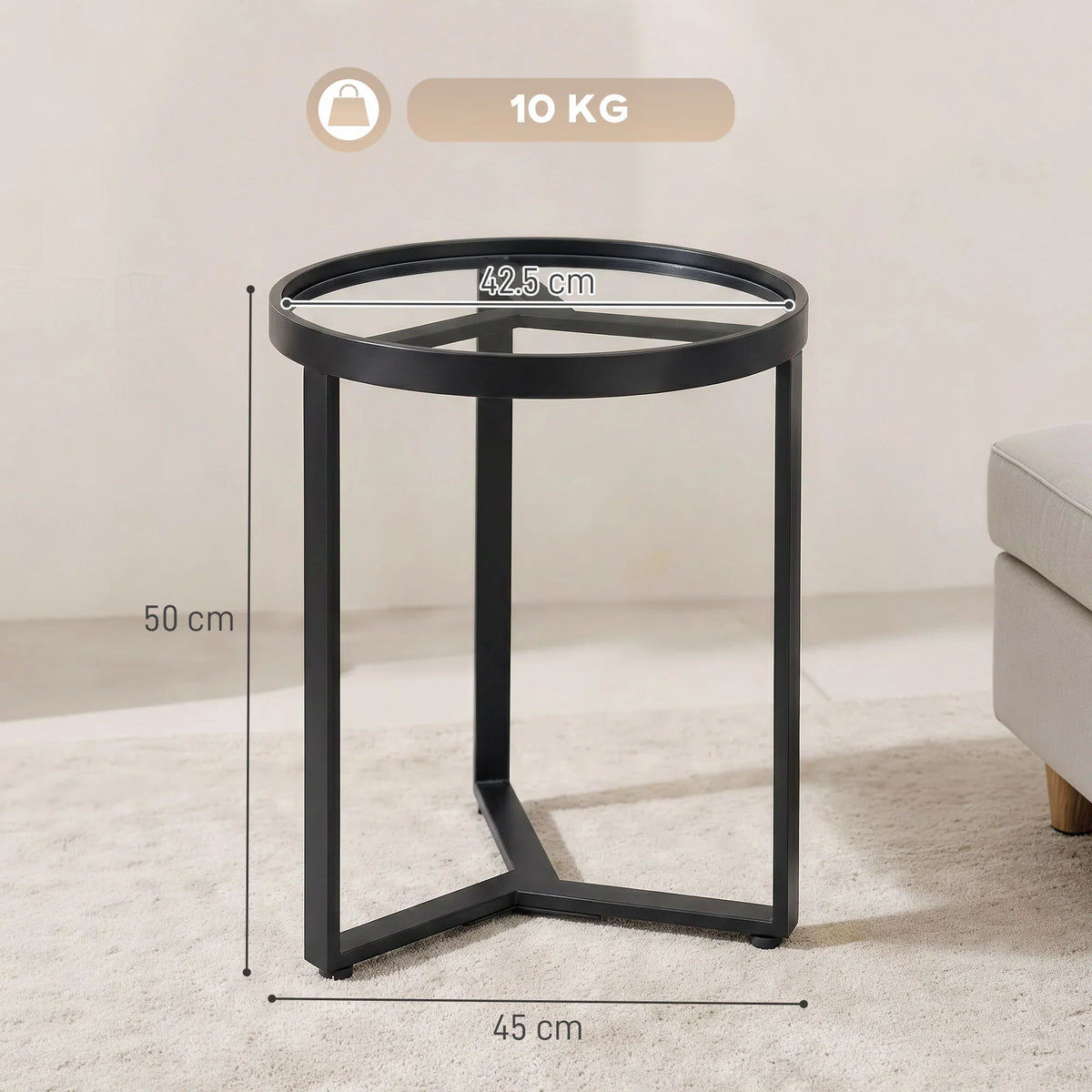 Black round side table with clear tempered glass top and open geometric metal frame