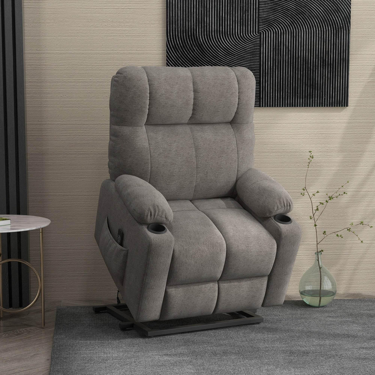 Grey velvet power lift recliner chair with padded arms and supportive backrest