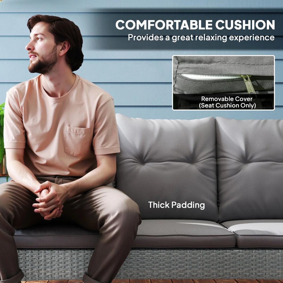 Grey rattan sofa with thick padded cushions and removable seat cushion cover