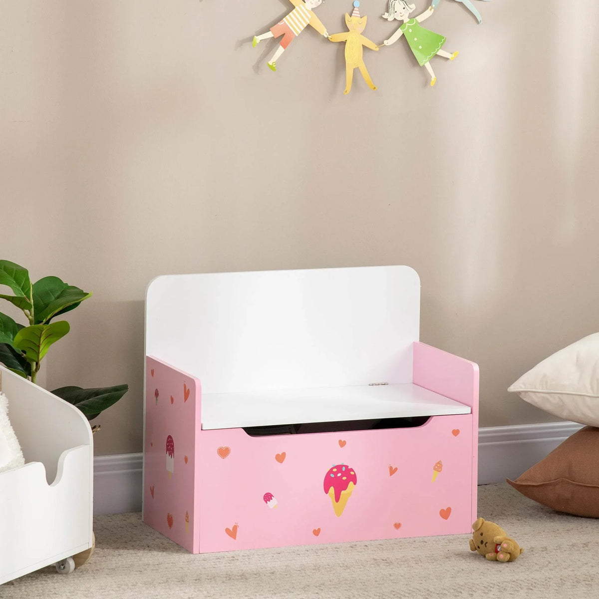 Pink wooden toy storage bench with white lid, open space, and heart-and-ice-cream decals
