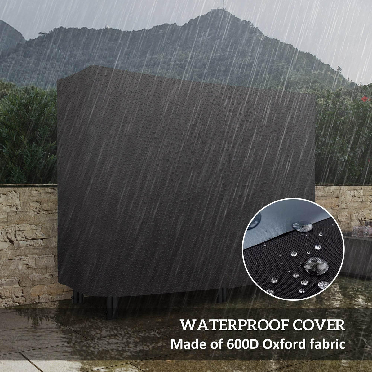 Black waterproof cover for firewood rack with visible water droplets on fabric