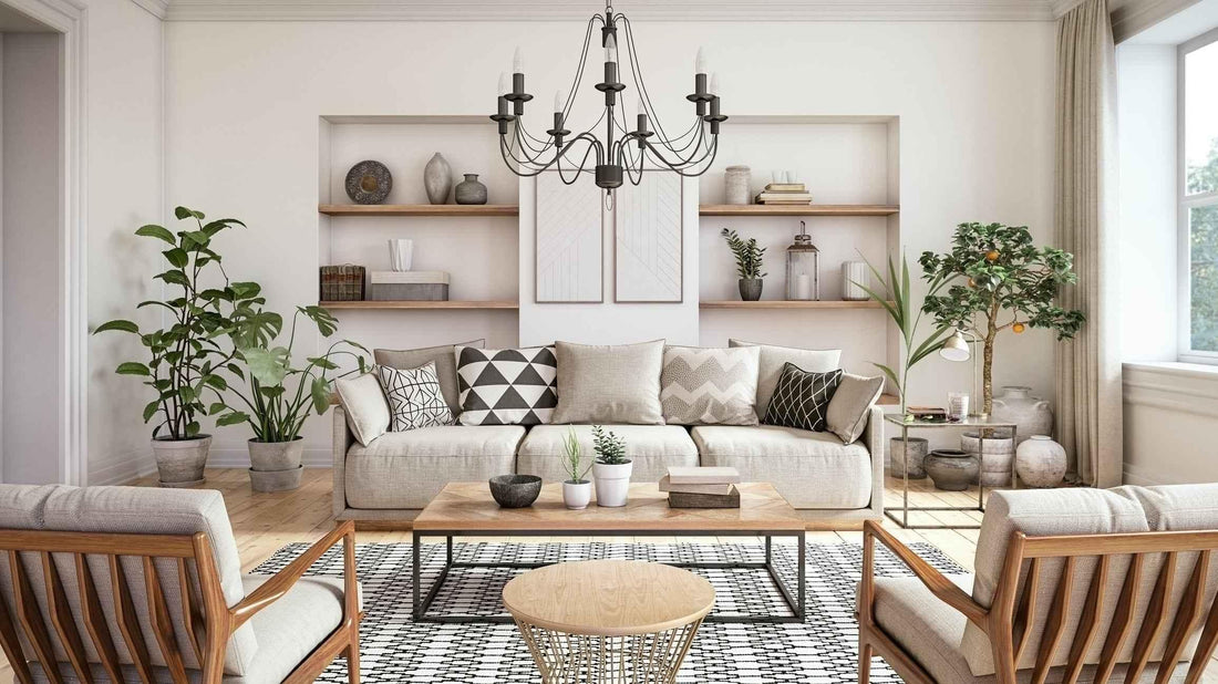 Modern living room with beige sofa, wooden coffee table, patterned rug, and decorative plants under chandelier