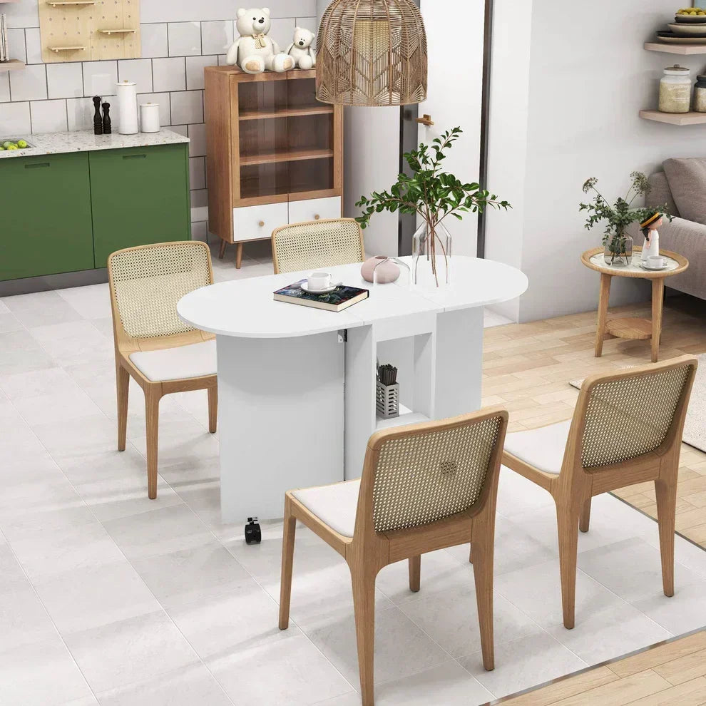White oval dining table with storage, paired with woven-back chairs in modern kitchen setting