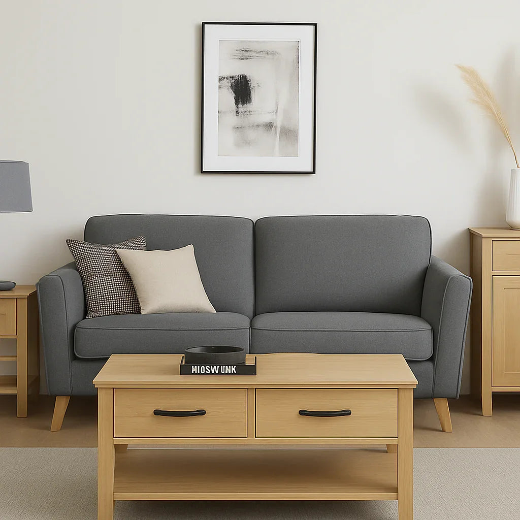 Gray fabric sofa with throw pillows, light wood coffee table, and modern living room decor