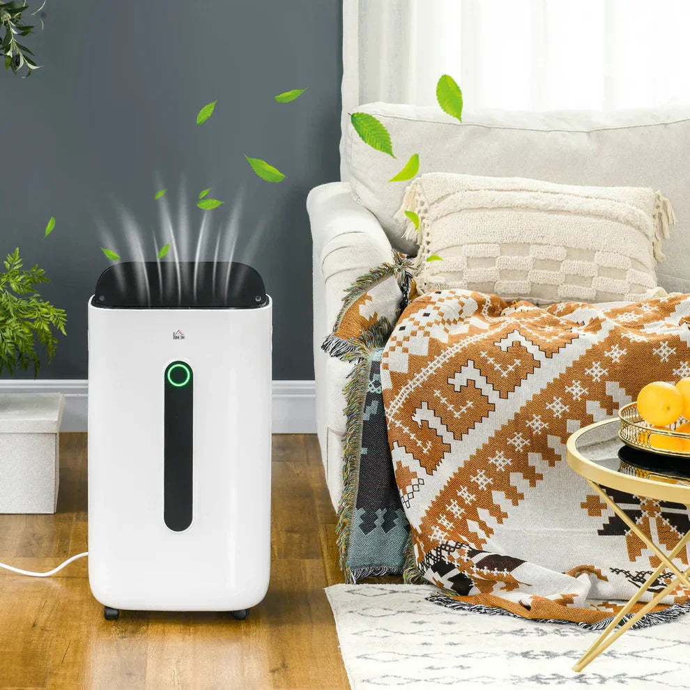 White air purifier with green light emitting clean air in cozy living room with sofa and plants