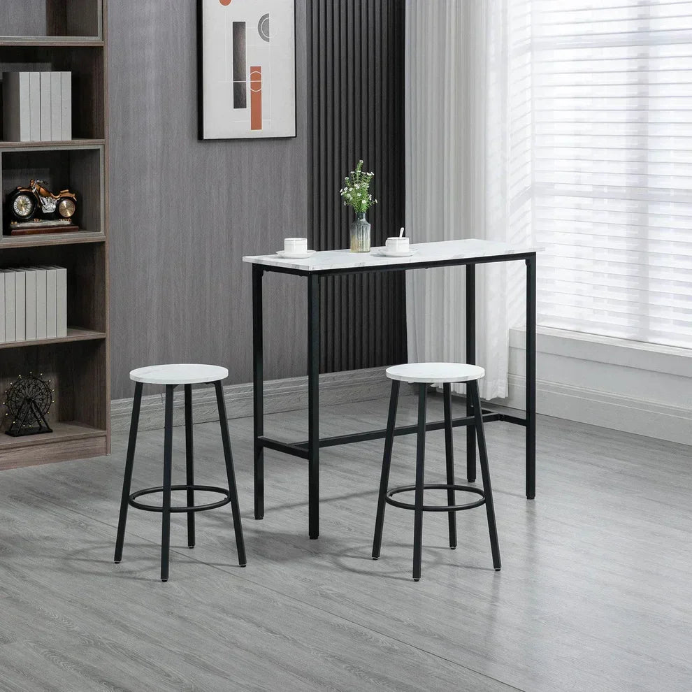 Modern white marble top bar table with black metal legs and matching stools for home or kitchen use