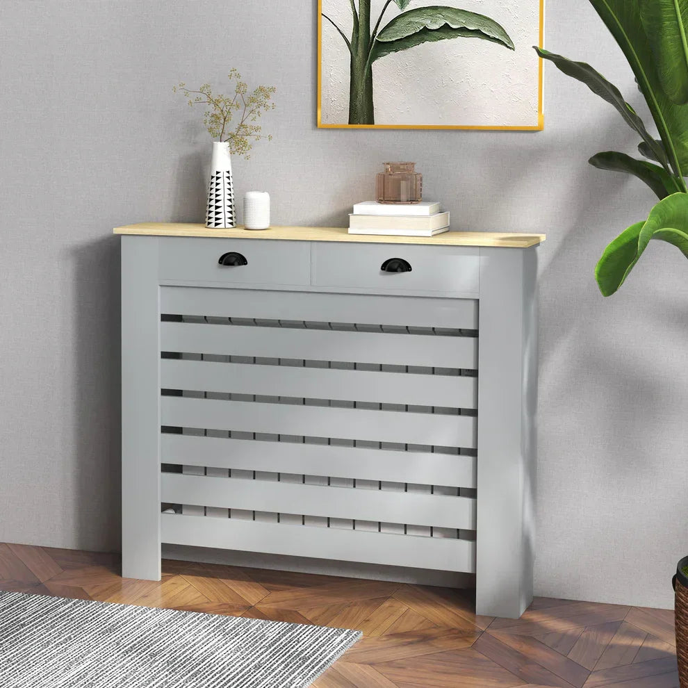 Gray slatted storage cabinet with wooden top, styled in modern home decor