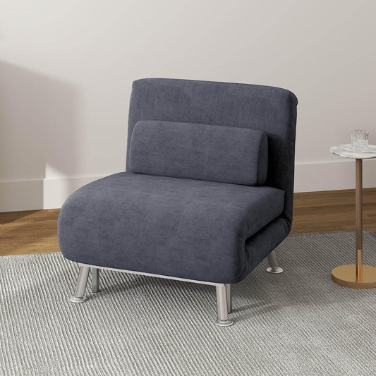 Modern grey fabric accent chair with metal legs on a light rug next to a round side table