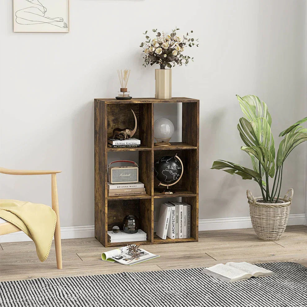Rustic wooden cube bookshelf with 6 compartments, styled with books, globe, and decor in modern living room