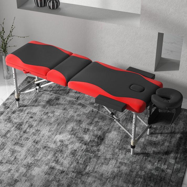 Red and black portable massage table with face cradle, ideal for home or professional use