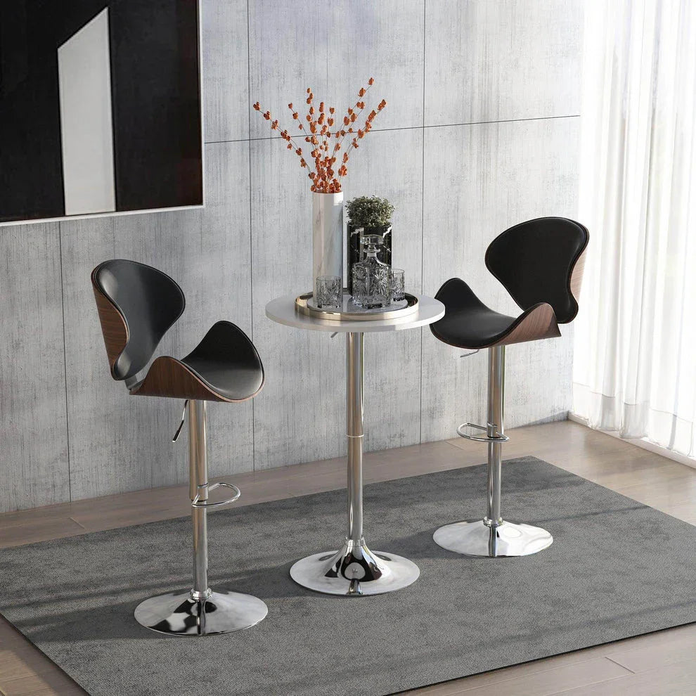 Modern black bar stools with chrome bases and wooden accents, paired with a sleek round table in a stylish home setting