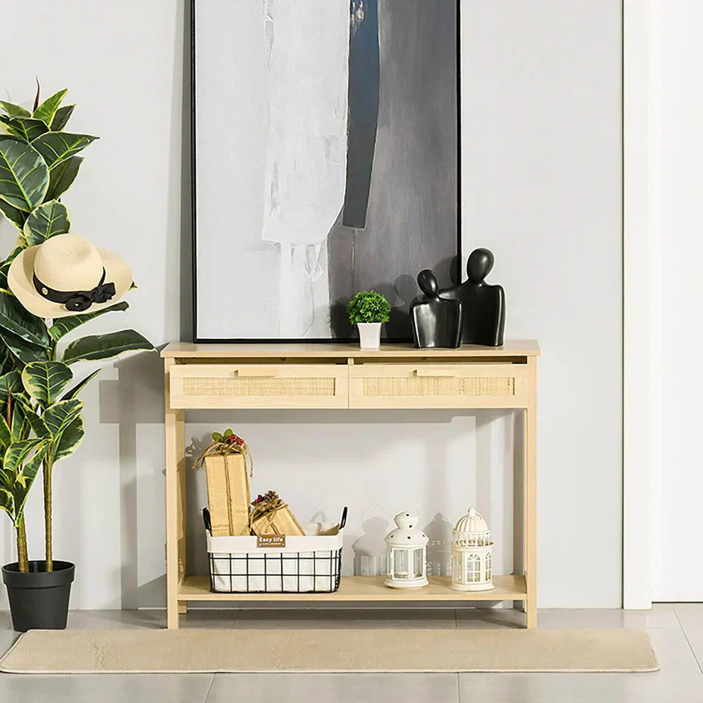 Modern console table with storage shelf and drawers, decorated in a bright home entryway