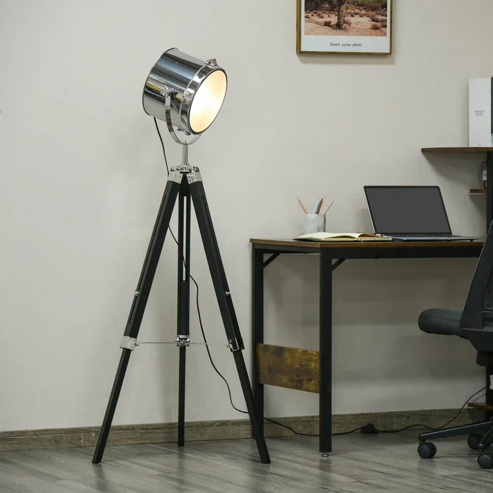 Modern tripod floor lamp with chrome spotlight, perfect for home office or living room lighting
