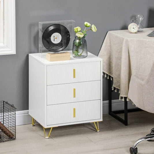 Modern white three-drawer side table with gold handles in home office decor setting