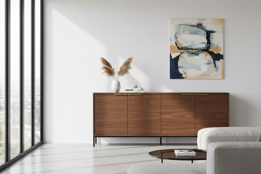Modern wood sideboard in bright living room with abstract wall art and minimalist decor