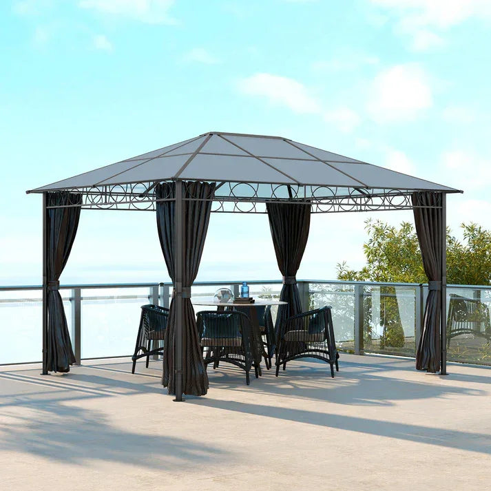 Elegant outdoor gazebo with black curtains and wicker furniture on a sunny patio