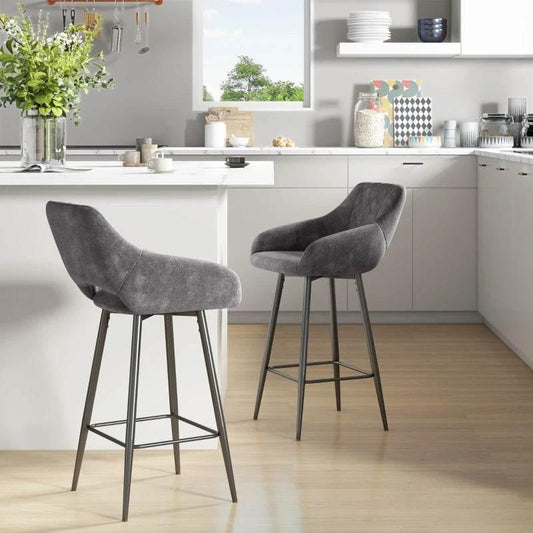 Modern grey fabric bar stools with metal legs in a bright, stylish home kitchen setting.