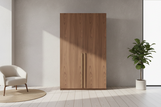 Modern wooden wardrobe in a minimalist room with a cream armchair and green potted plant