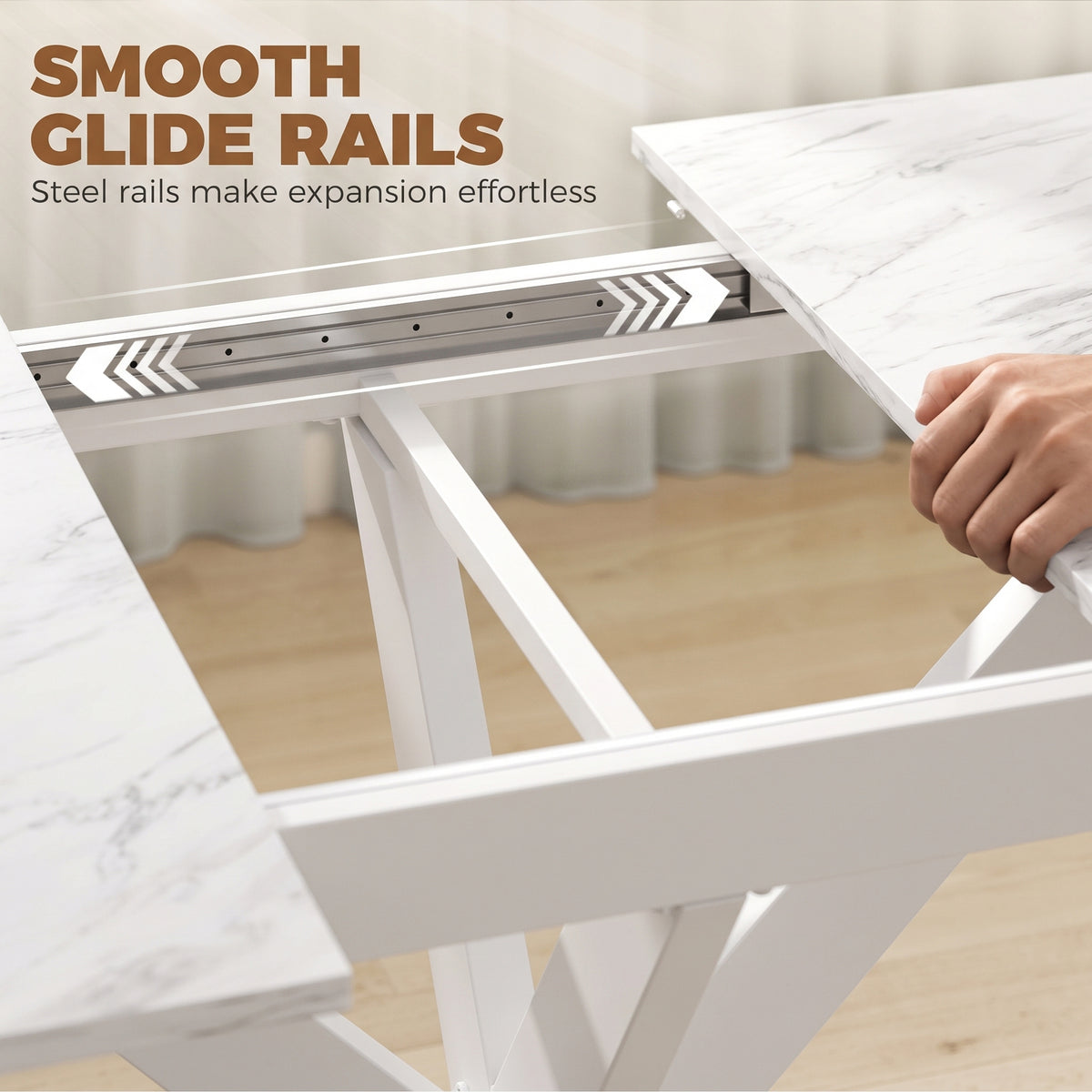 Close-up of smooth glide expansion rails under a white extendable dining table