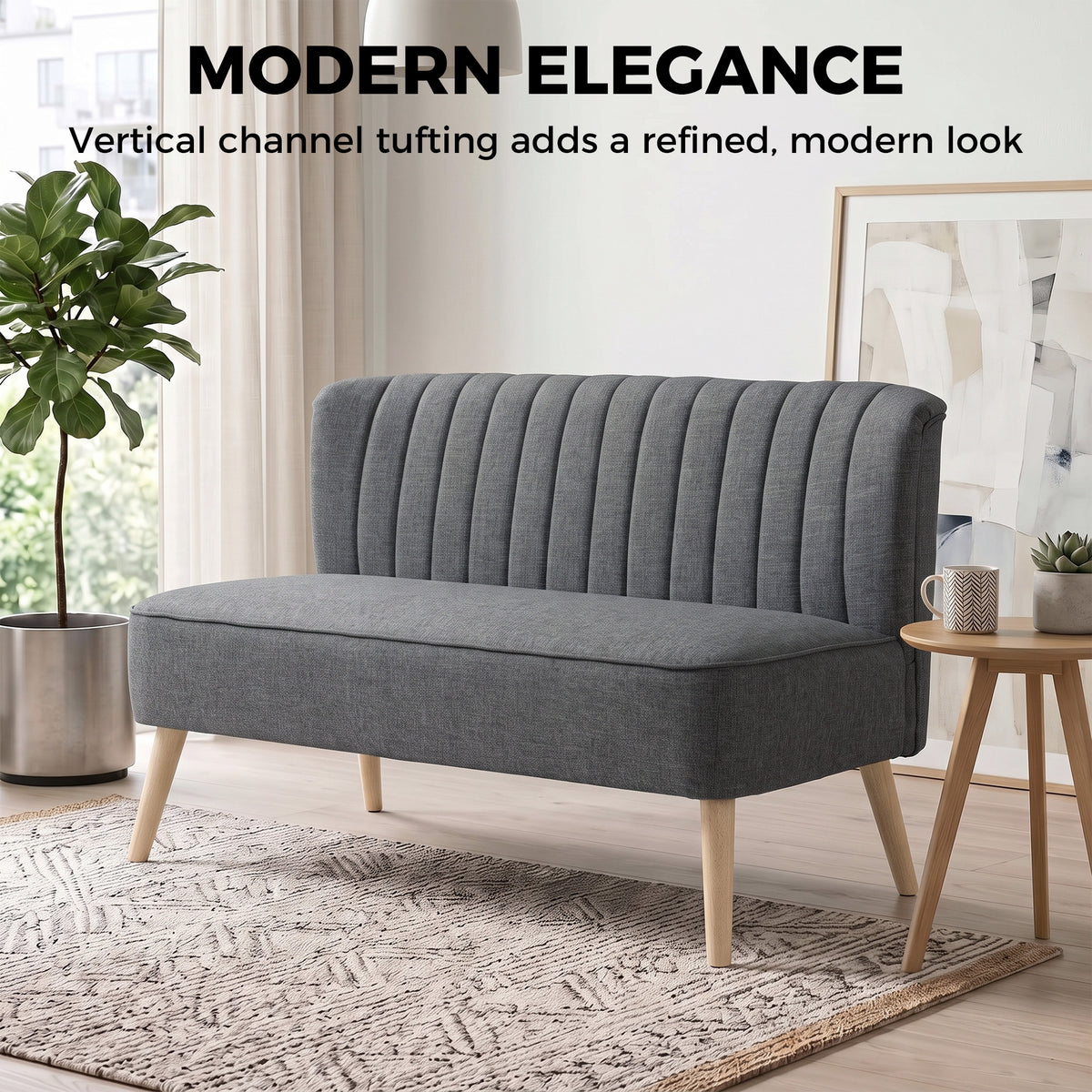 Dark grey modern loveseat sofa with vertical channel-tufted back and wood legs