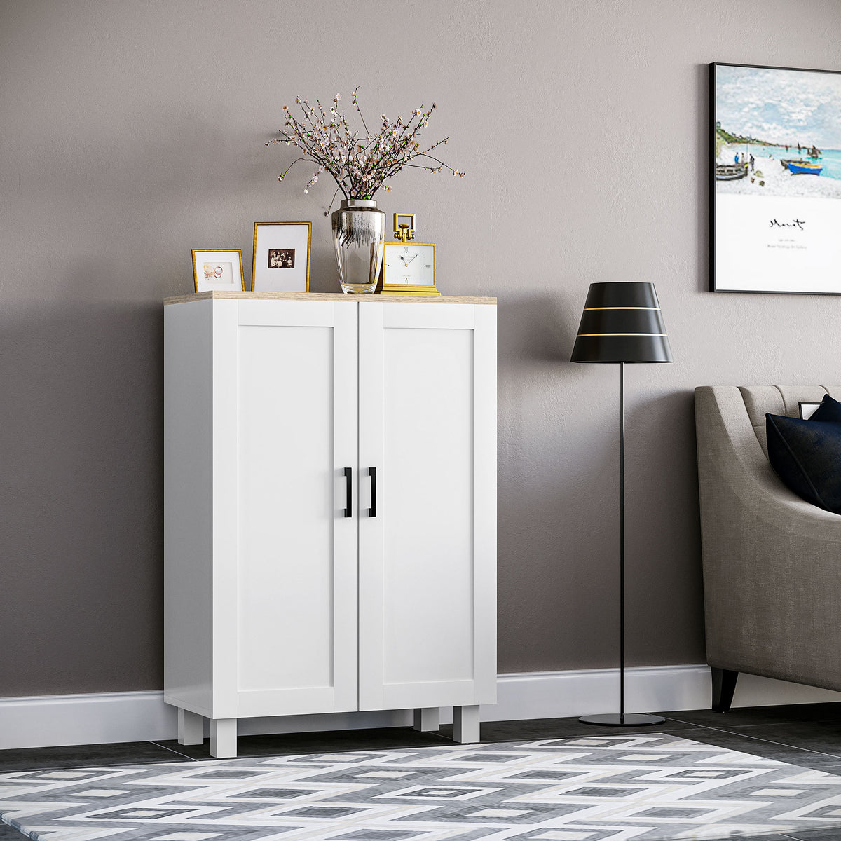 White two-door storage cabinet with black bar pulls on the front