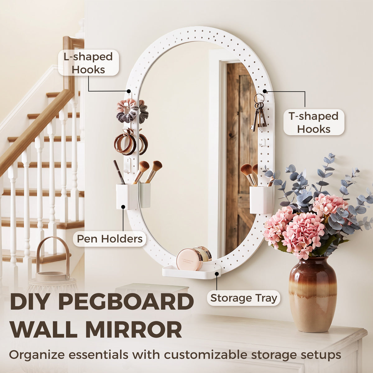 White DIY pegboard oval wall mirror with hooks, pen holders, and storage tray
