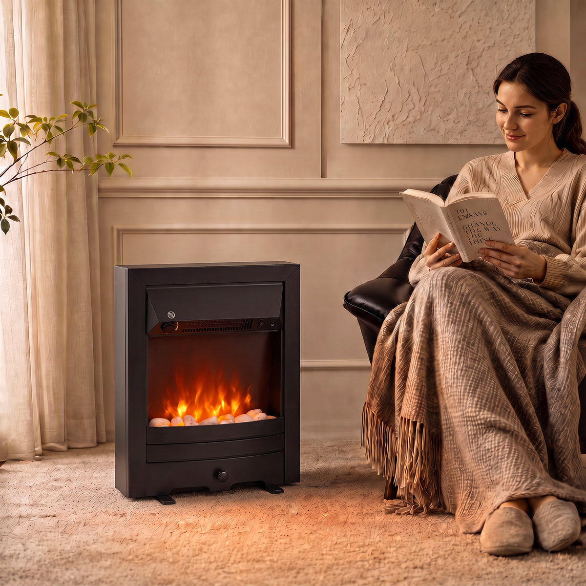 Black freestanding electric fireplace stove with glowing LED flames behind glass front panel