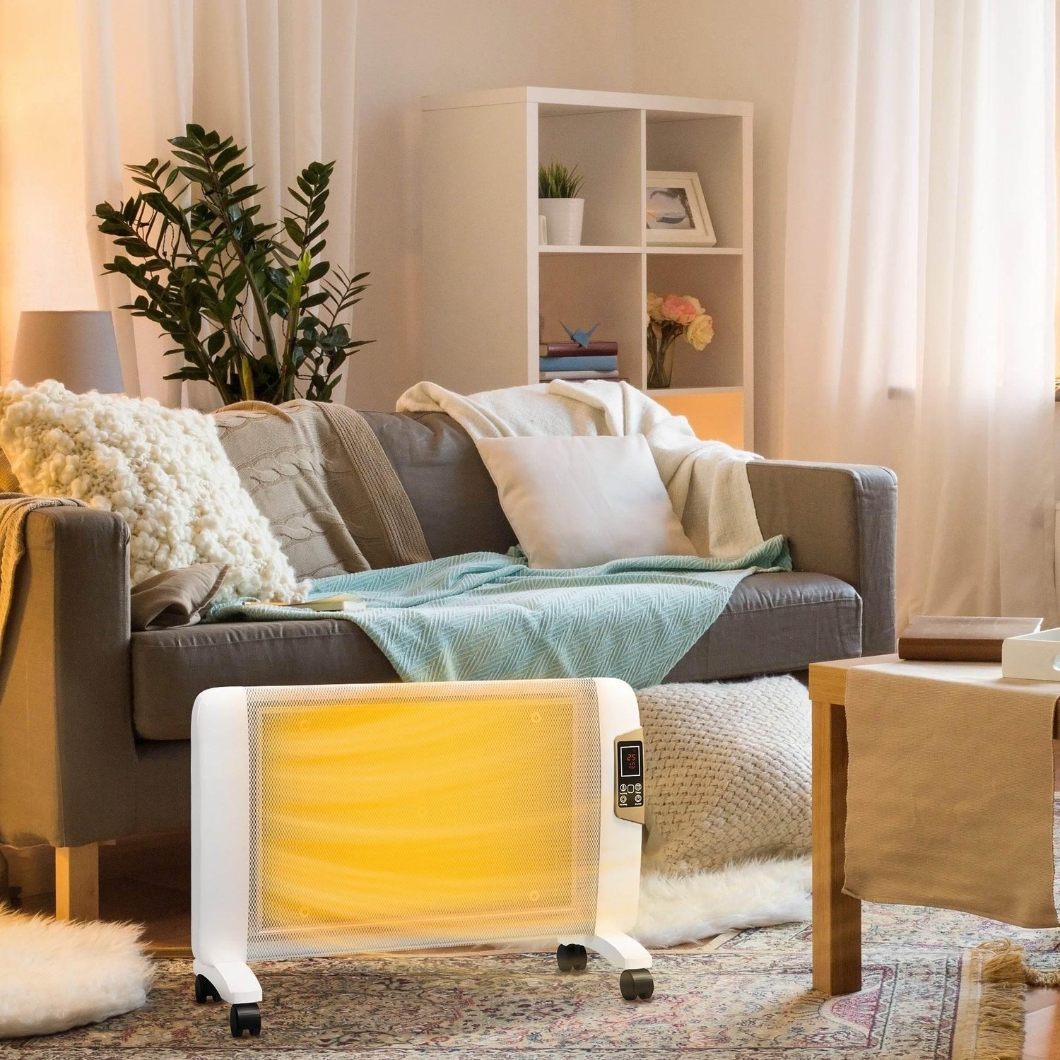 White portable electric heater with glowing heat panel and side control screen
