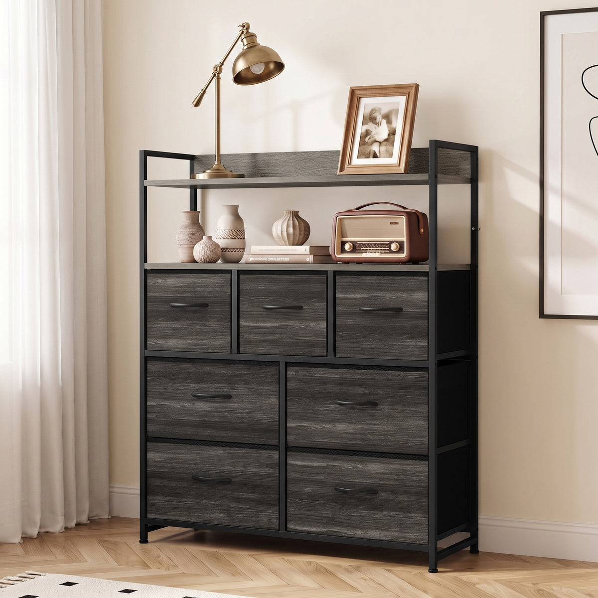 Grey wood-effect fabric dresser with open shelves and stacked drawers in black frame
