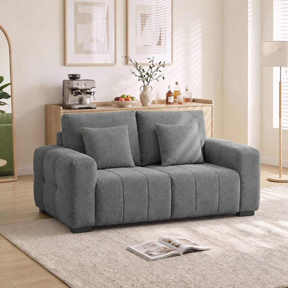 Grey velvet 2-seater sofa with back and seat cushions, square wooden legs visible.