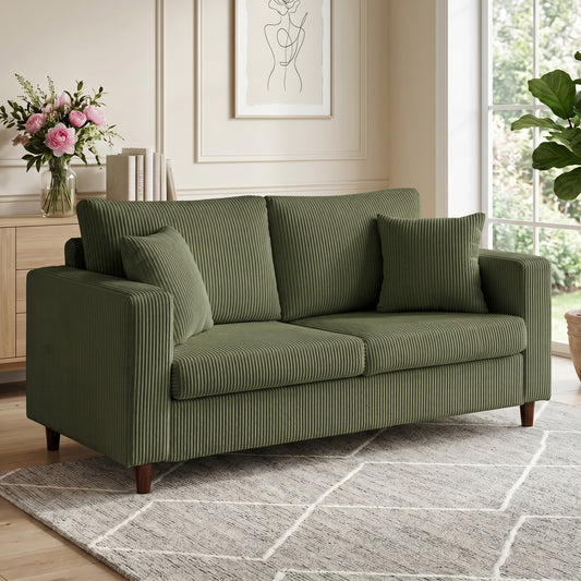 Green corduroy loveseat sofa with wide seat and tufted back cushions