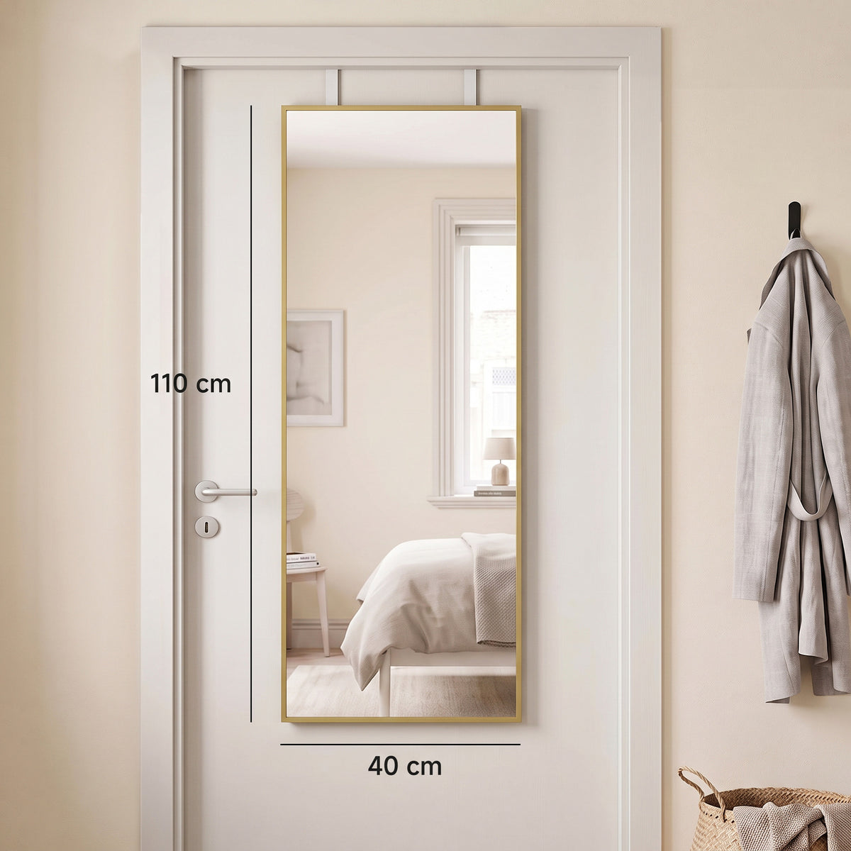 Full length gold-tone mirror with a 40 cm by 110 cm frame on a door