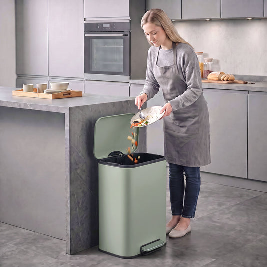Pale green metal kitchen pedal bin with removable inner bucket and soft-close lid