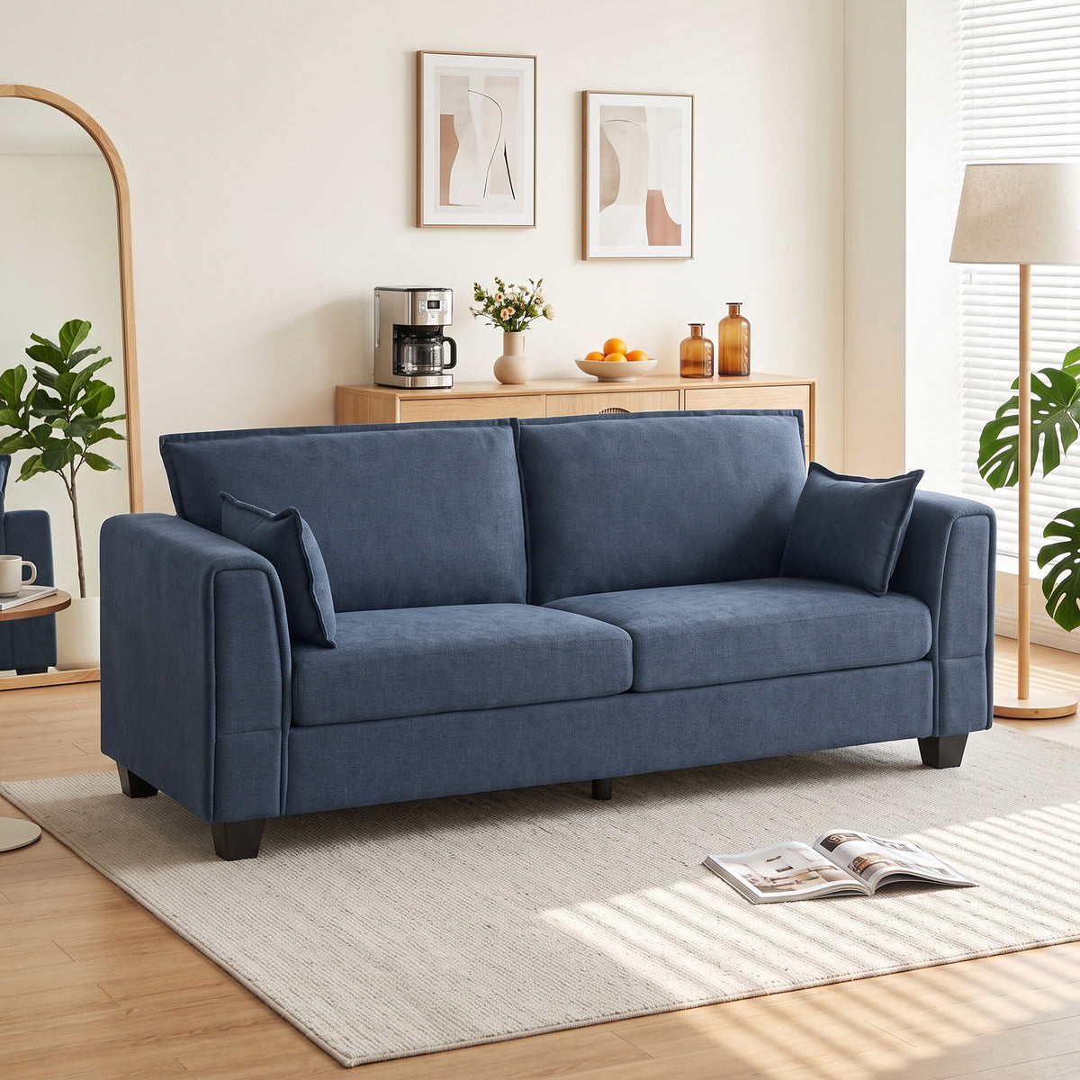 3-seat sofa with armrests, dark blue upholstery and two accent cushions on legs